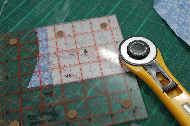 ruler and rotary cutter - from A Quick and Simple Needlebook Tutorial by Helen of Hugs 'n Kisses