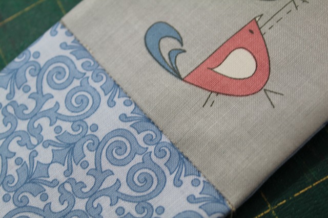 a stitched piece of fabric - from A Quick and Simple Needlebook Tutorial by Helen of Hugs 'n Kisses